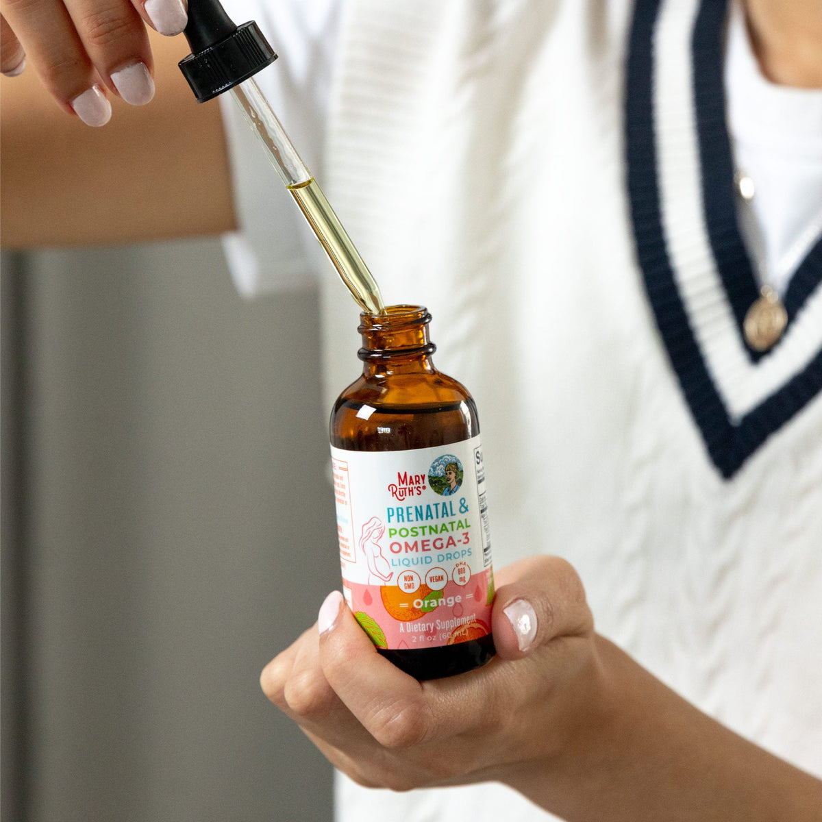 Prenatal & Postnatal Omega-3 Liquid Drops 2 oz Lifestyle Bottle 3